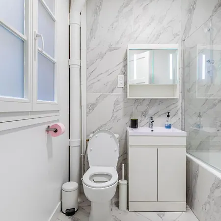 Апартаменты Guestready - Luxe Living Near The Eiffel Tower Париж